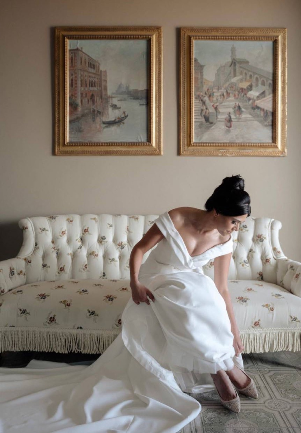 Elegant bride on a sofa